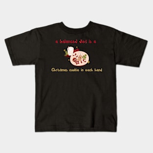 a balanced died is a Christmas cookie in each hand Kids T-Shirt